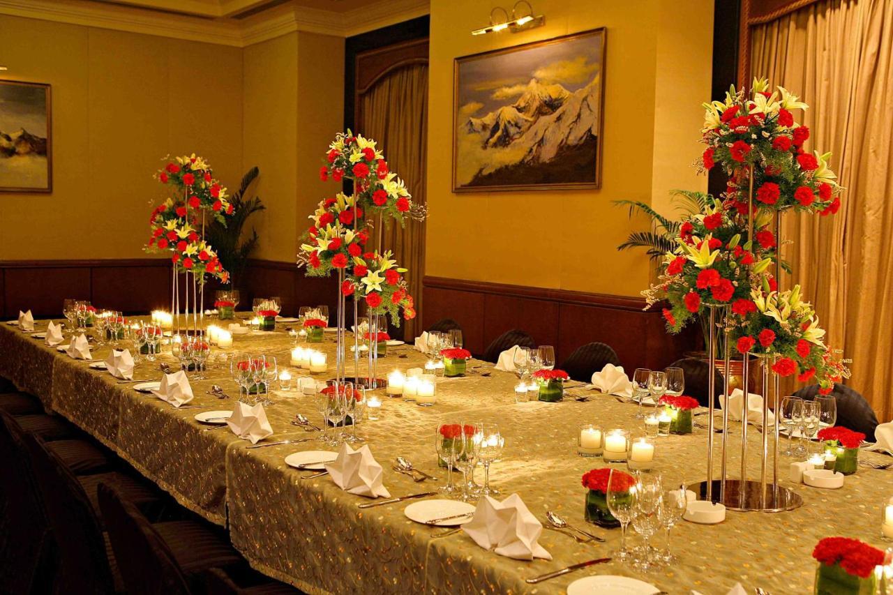Eros Hotel New Delhi, Nehru Place Dış mekan fotoğraf A table set for a formal dinner