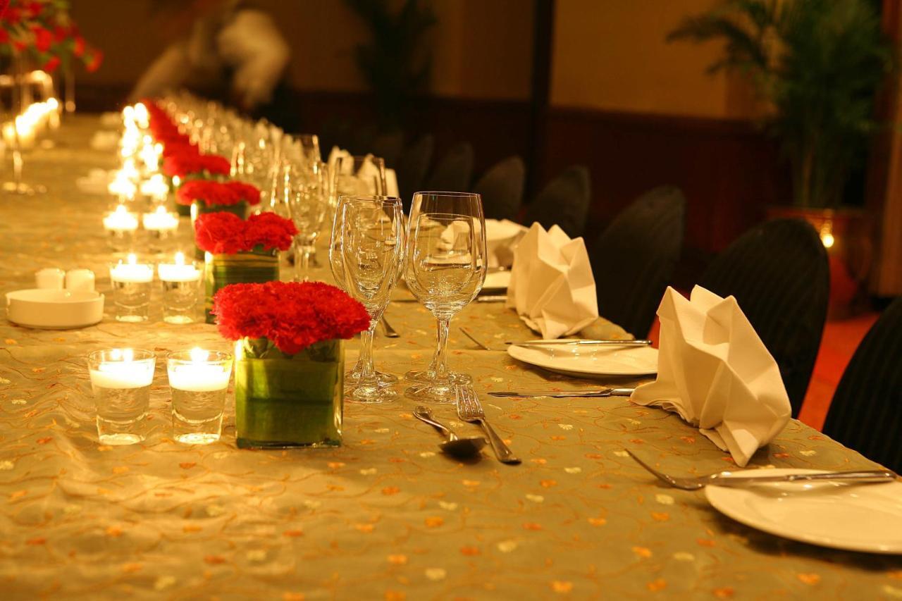Eros Hotel New Delhi, Nehru Place Dış mekan fotoğraf A table set for a formal dinner